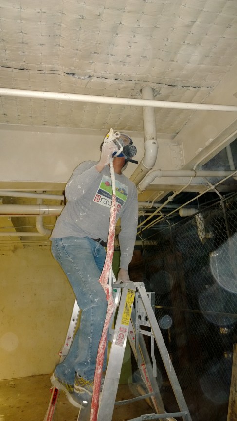 Mike sprays the ceiling, too!