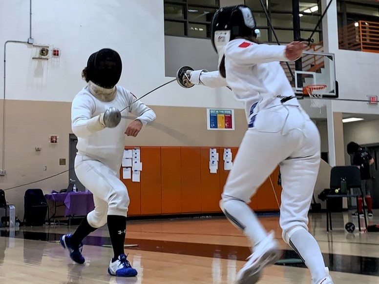 Evan and Sarah fencing